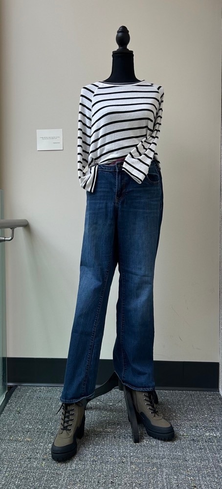 striped black and white shirt with jeans and combat boots