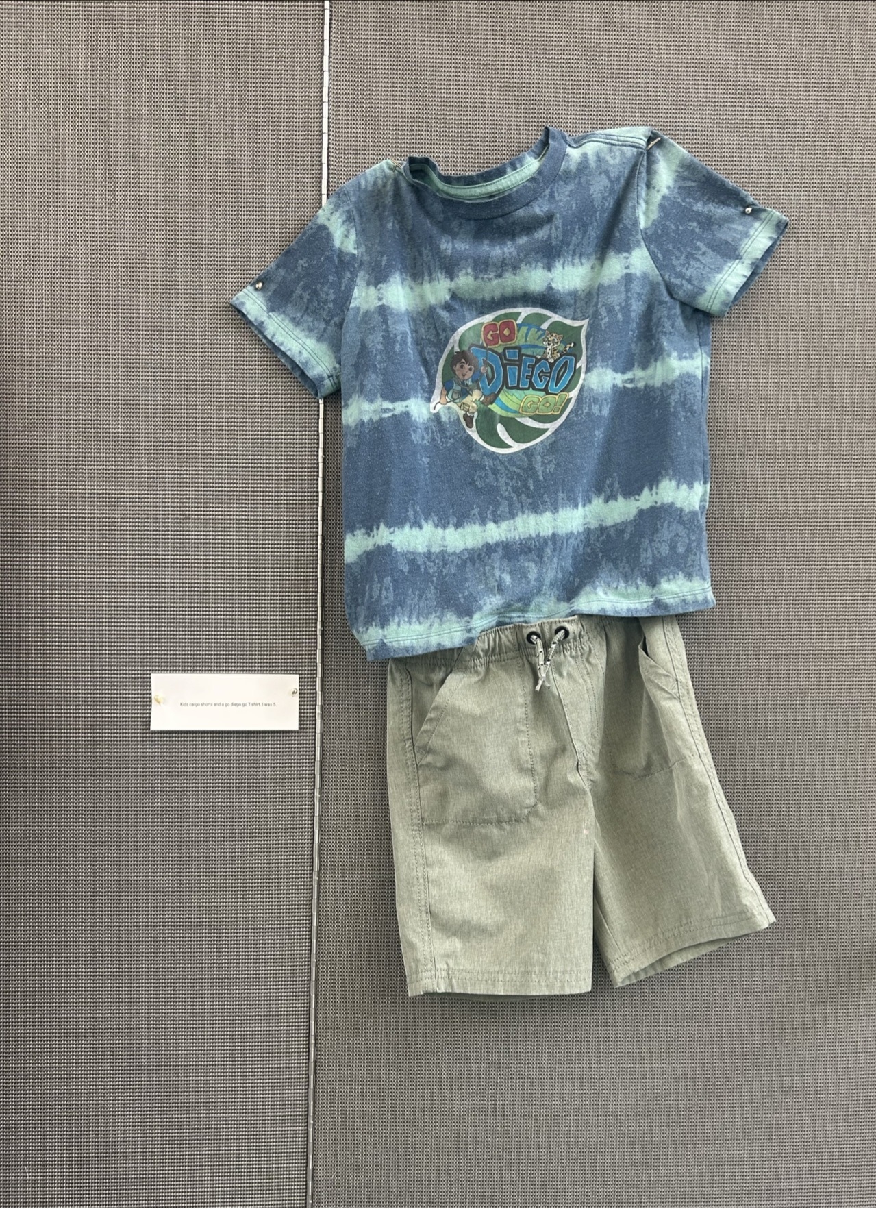 tie dye blue kids t-shirt with Go Diego Go logo and green shorts.