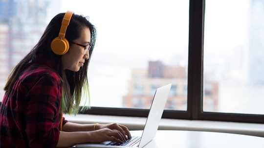 Student working on a laptop