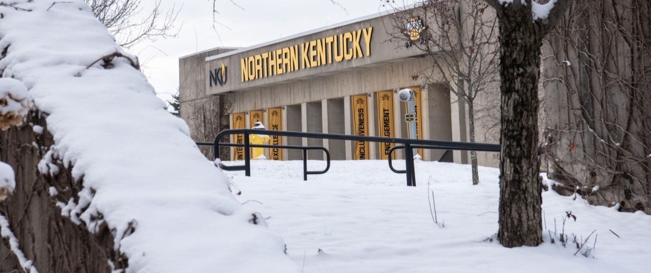 A picture of Regent's Hall on the NKU Campus with a snowy foreground