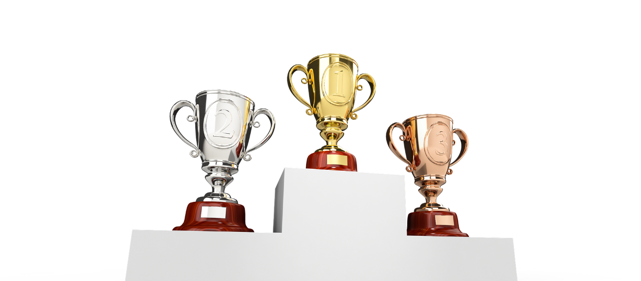 A graphic of trophies on a winners dais