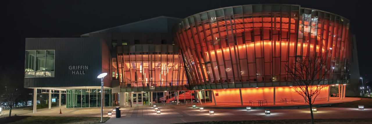 Griffin Hall lit up in Orange for Women's History Month
