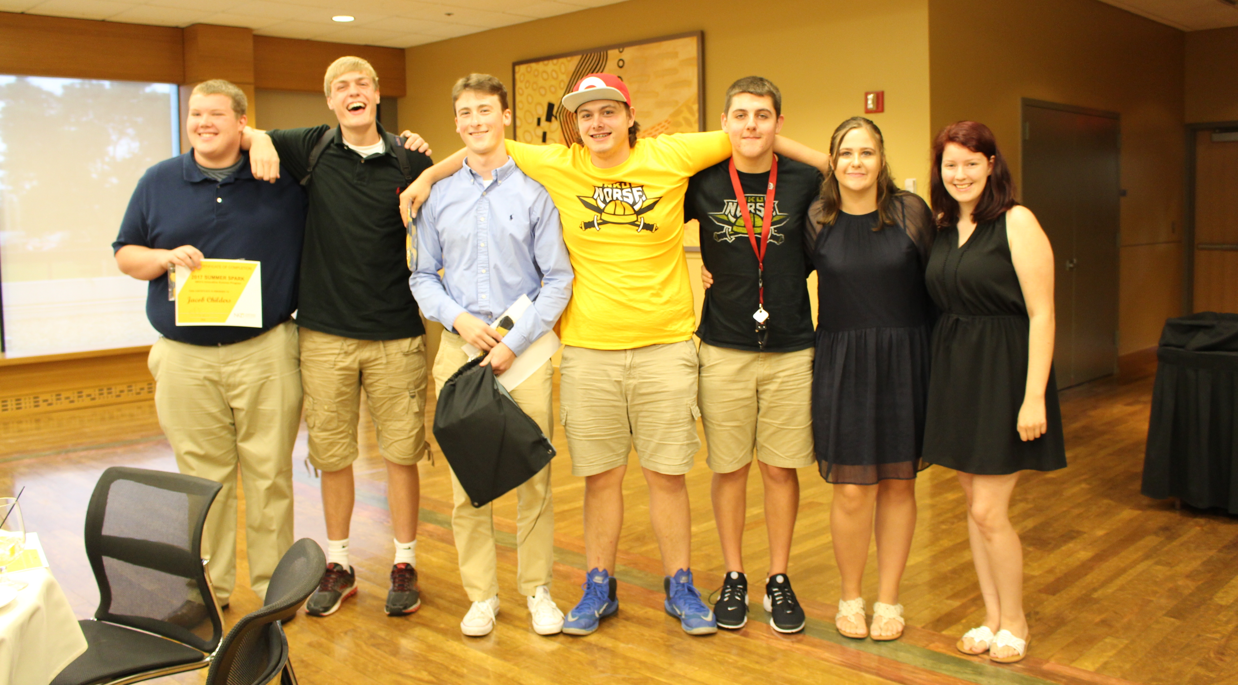 Students standing together at an event