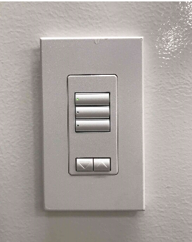 Efficient Lighting Control panel for controlling lights showing four sections to press based off desired lighting