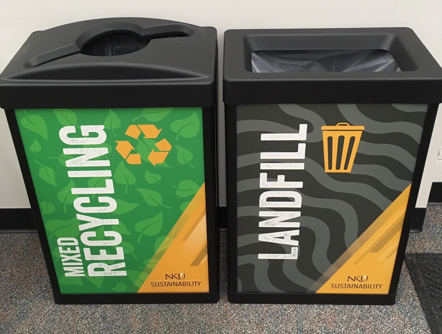 NKU's newly branded bins titled "mixed recycling" and "landfill"