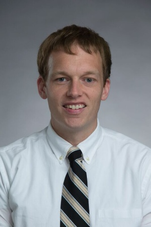 Professional headshot of John Hall