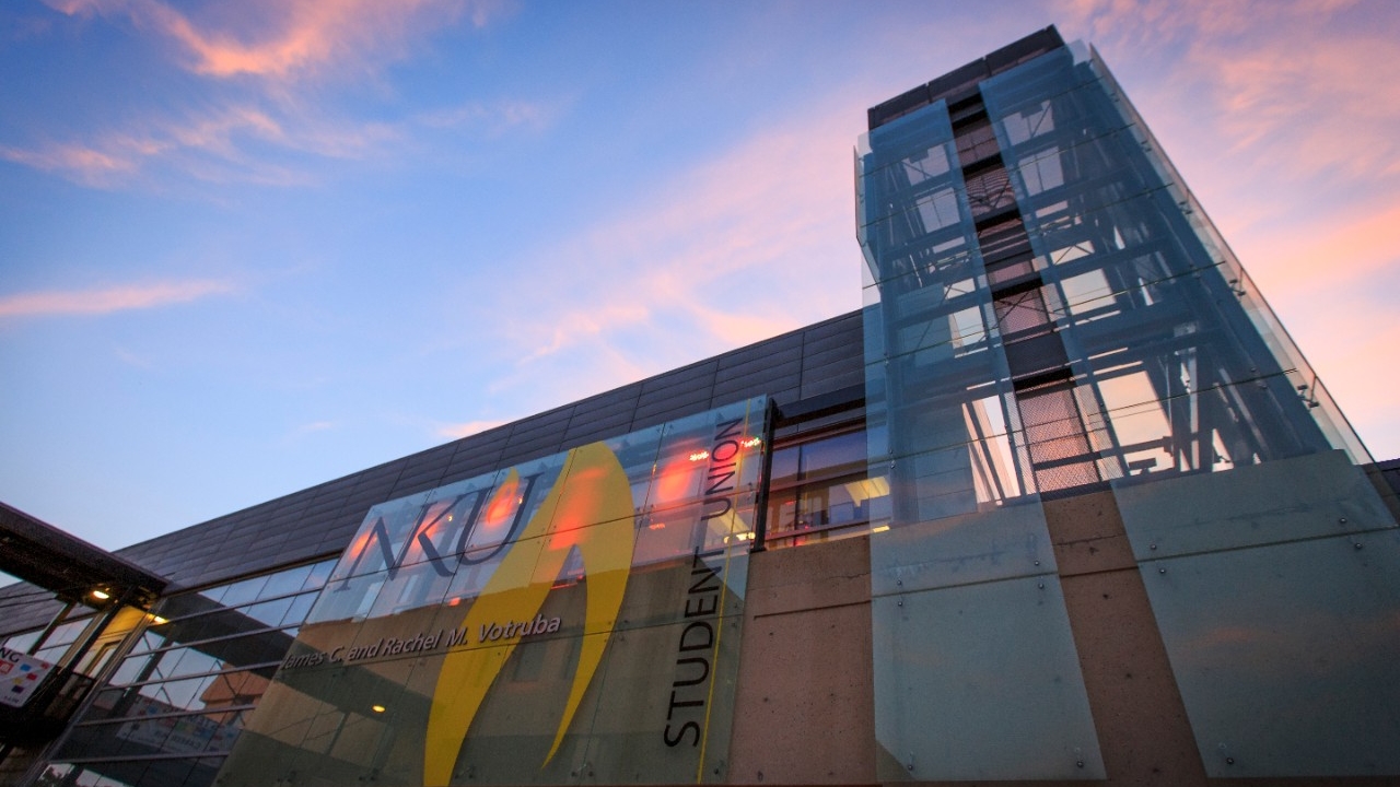 Scenic view of student union at sunset
