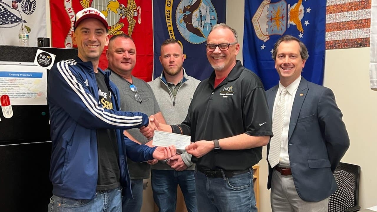 Rusty Mardis accepting VFW donation.