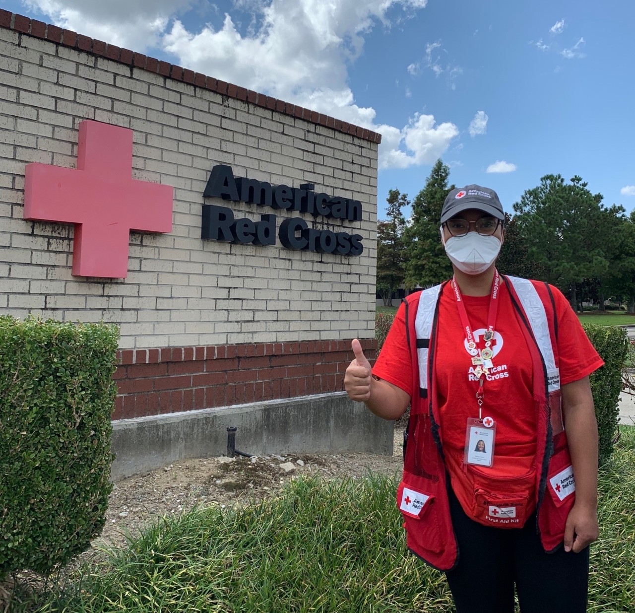 Dennia Palmer standing outside American Red Cross in Louisiana